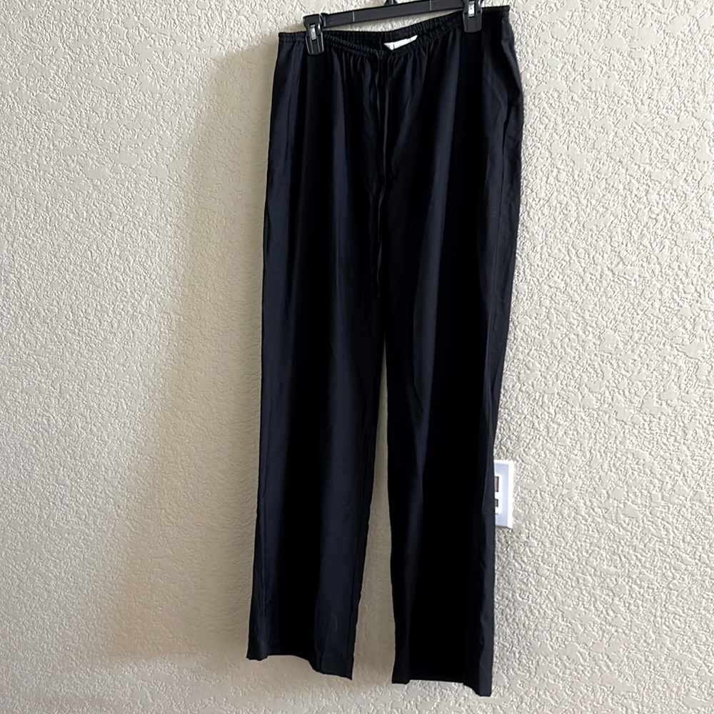 H&M black wide leg pants with draw string. New w/o tags.